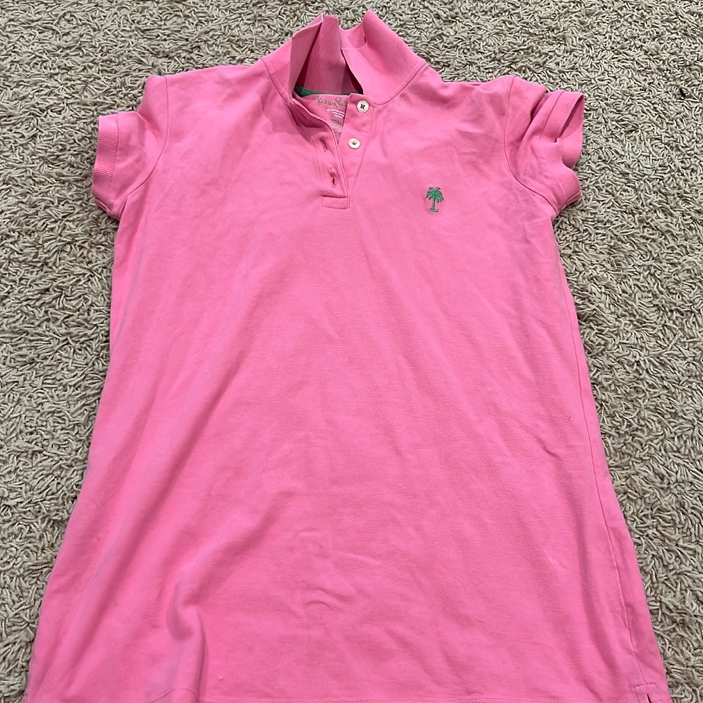 Pink performance polo.